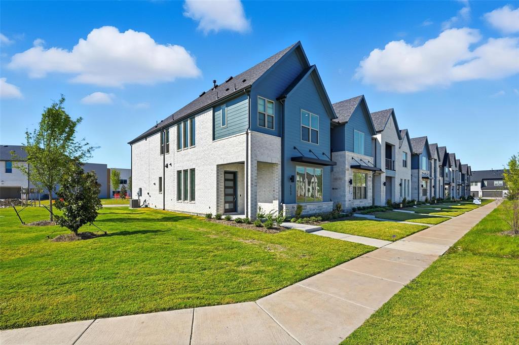 2533 Brunswick Way, Unit 2533 Allen, TX 75013 - Photo 2 of 24 a view of a big house with a big yard and potted plants