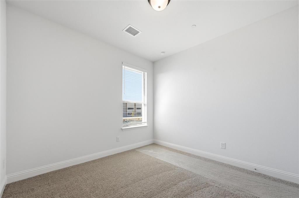 2533 Brunswick Way, Unit 2533 Allen, TX 75013 - Photo 20 of 24 an empty room with a window