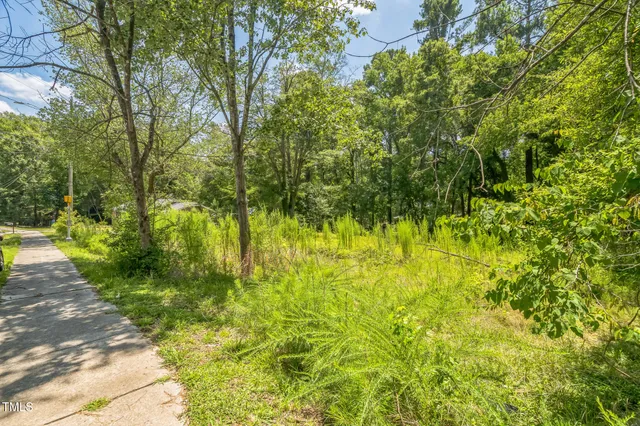 a view of swimming pool from a yard