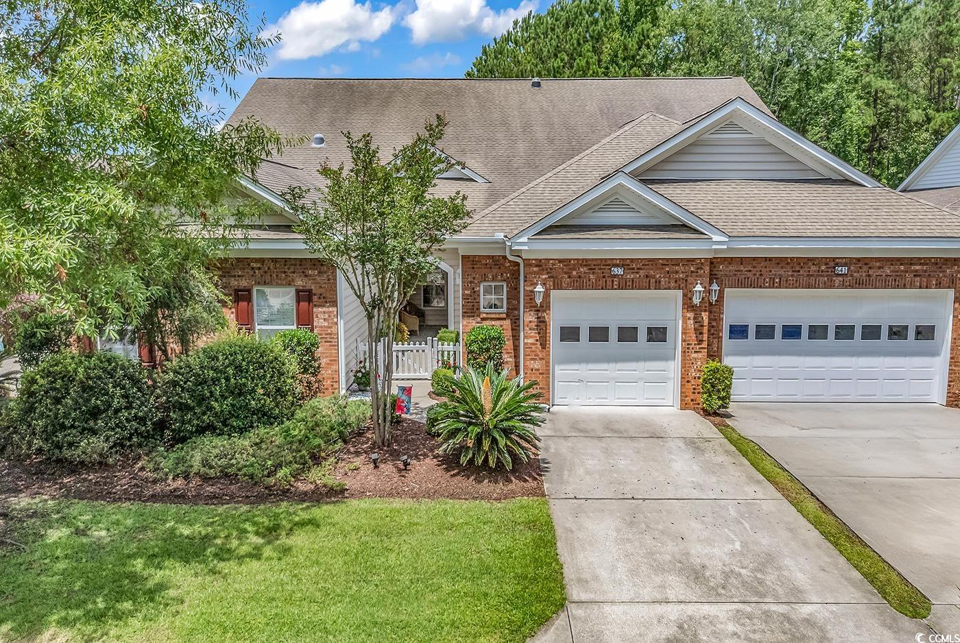 637 Botany Loop, Unit 637 Murrells Inlet, SC 29576 - Photo 1 of 40 View of front facade featuring brick siding, drive