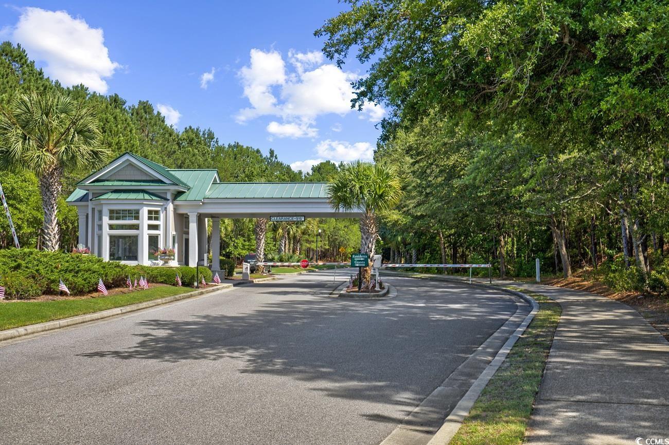 637 Botany Loop, Unit 637 Murrells Inlet, SC 29576 - Photo 33 of 40 View of asphalt street featuring curbs