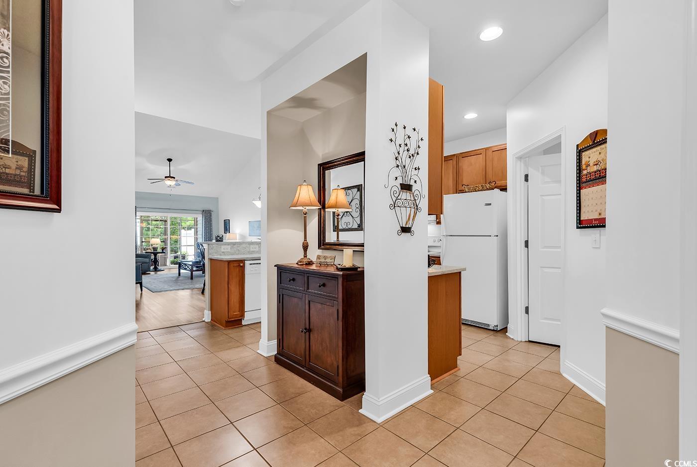 637 Botany Loop, Unit 637 Murrells Inlet, SC 29576 - Photo 4 of 40 Kitchen featuring white appliances, light tile pat
