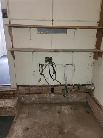 a view of a room with racks on the wall