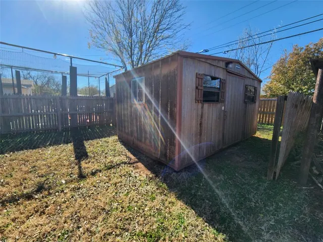 a view of a backyard of the house