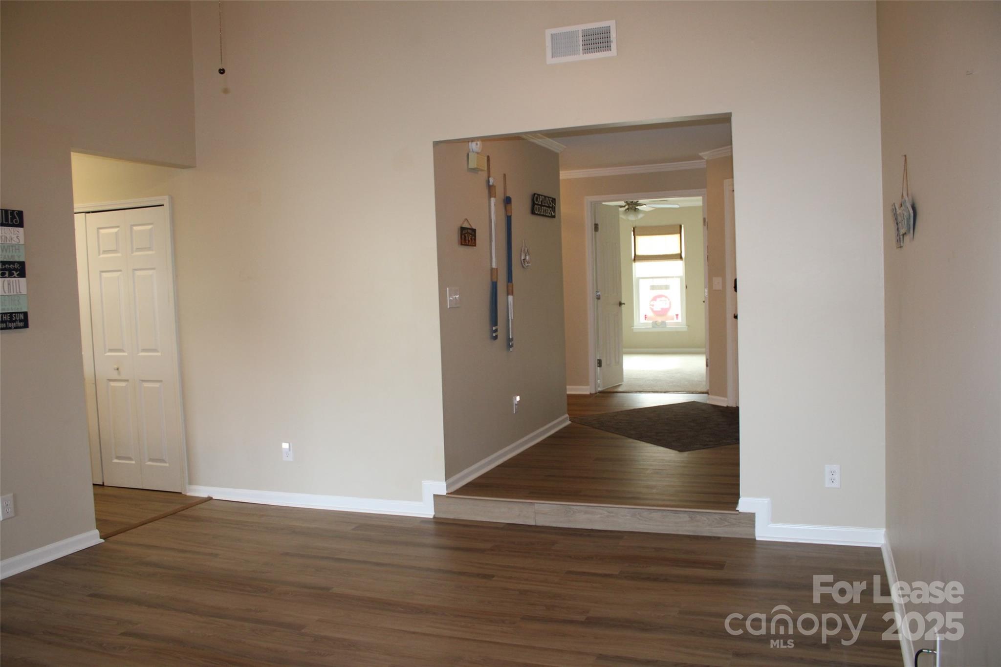 19839 Henderson Road, Unit M Cornelius, NC 28031 - Photo 12 of 23 a view of entryway with wooden floor