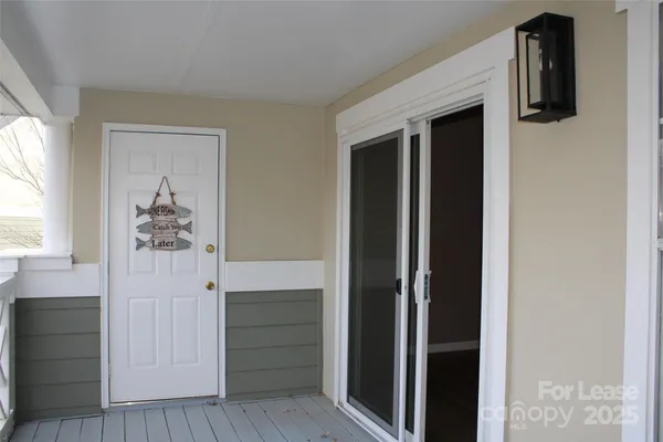 a view of hallway with walk in closet