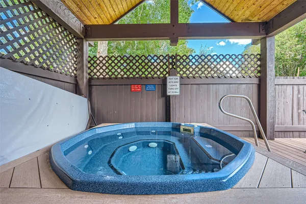 a sink sitting on top of a wooden floor