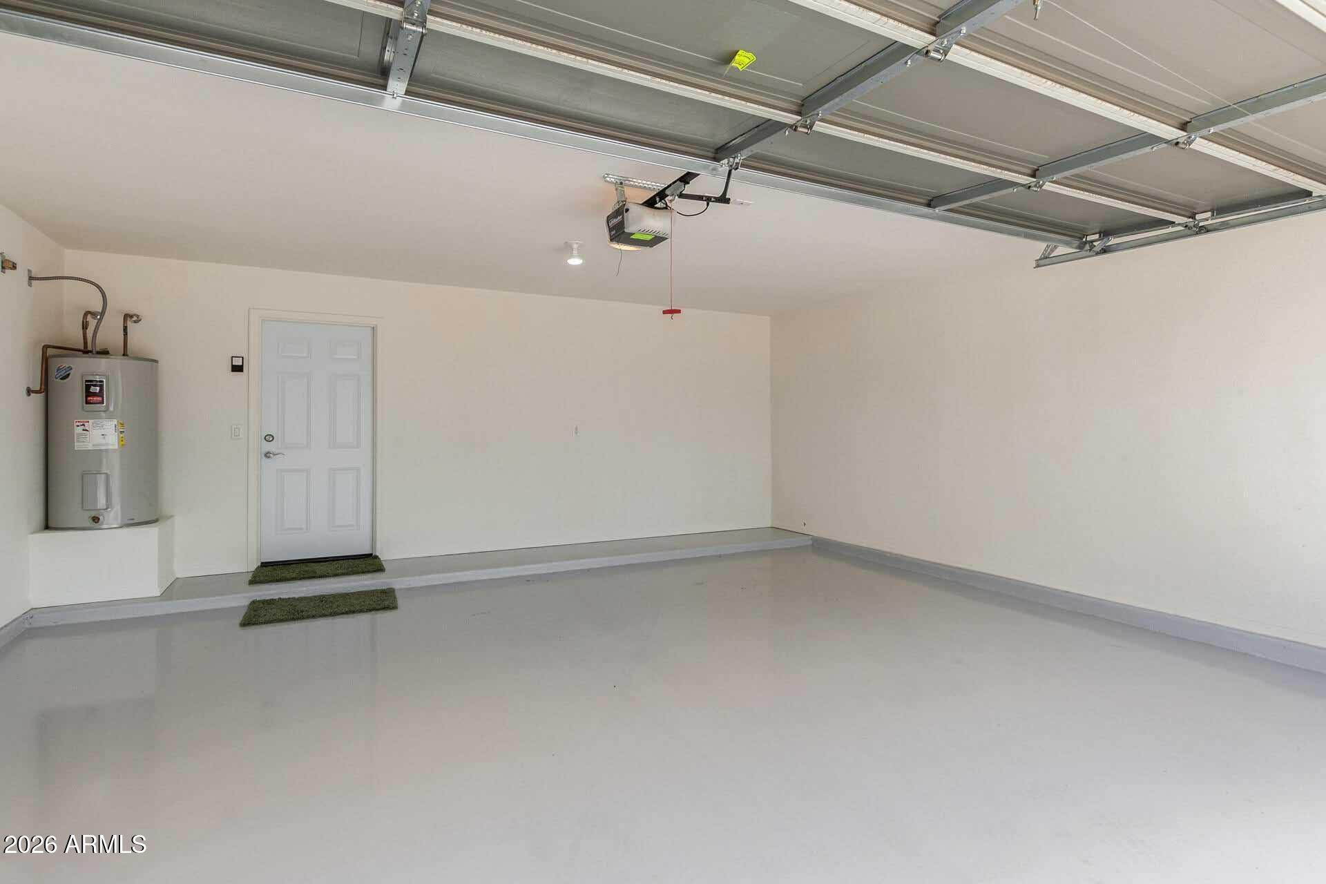 17618 West Calavar Road Surprise, AZ 85388 - Photo 21 of 24 a view of a room with gym equipment