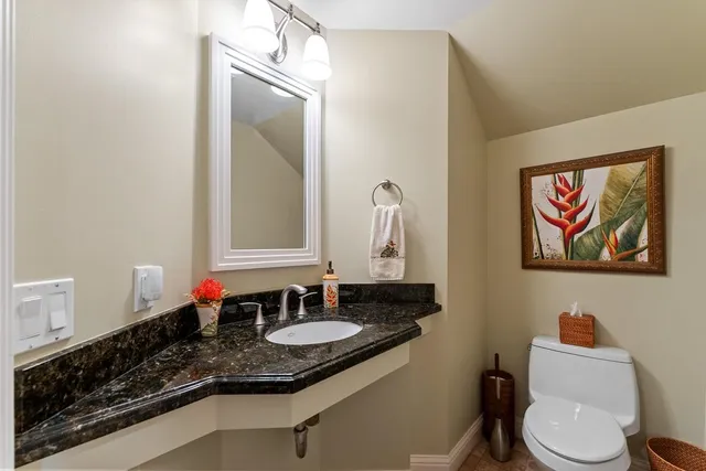 a spacious bedroom with a large bed and a large window