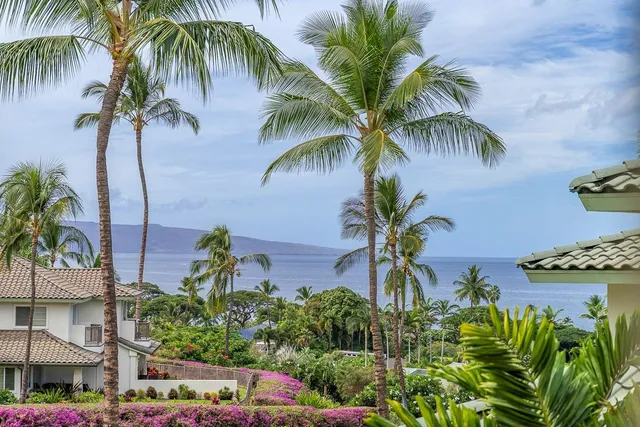 a bathroom with a bathtub sink and mirror