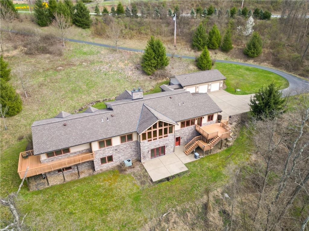 2353 Nicholson Road Sewickley, PA 15143 - Photo 4 of 50 Rear elevation shows large primary suite deck and deck from the kitchen area.