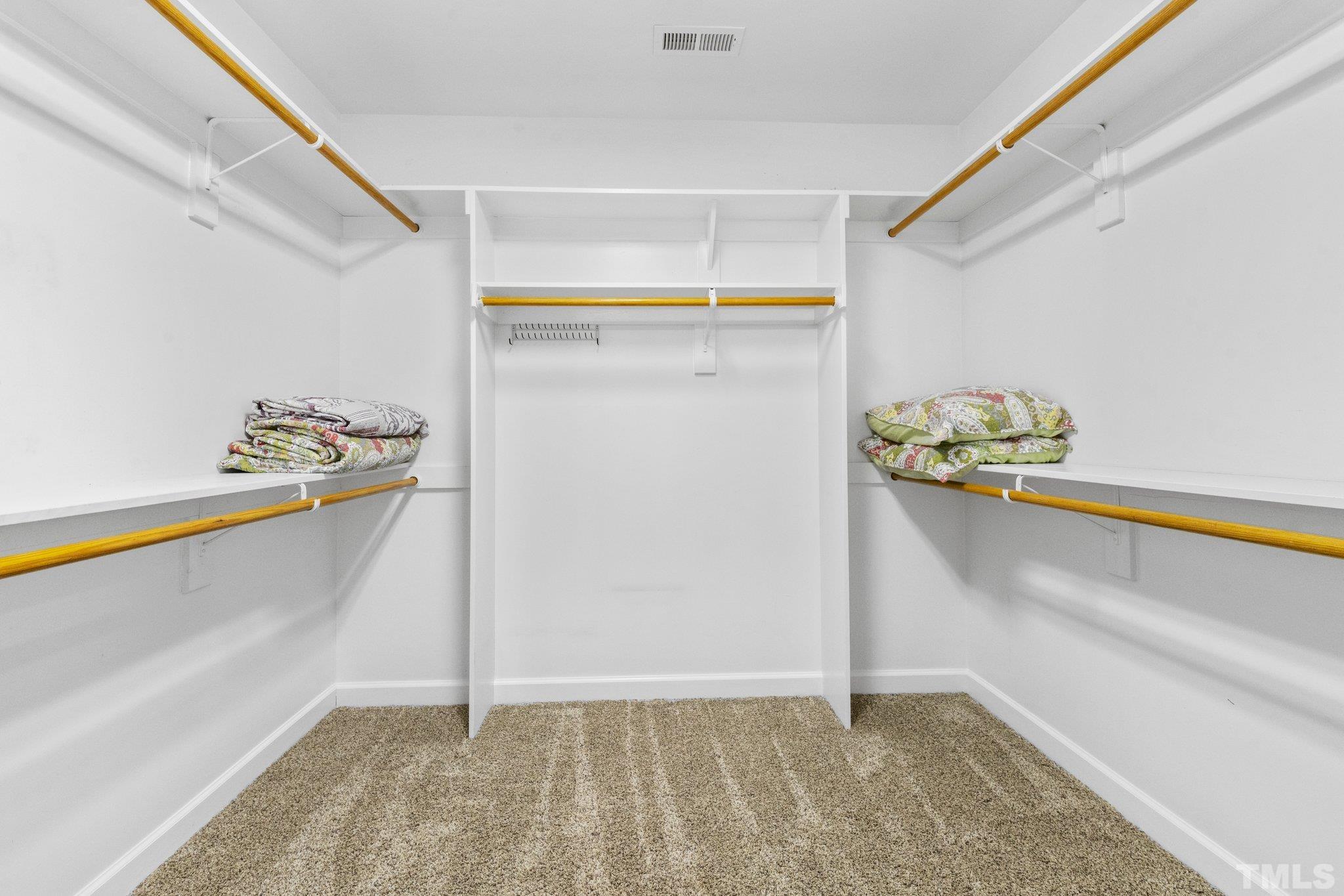 6304 Meerbrook Court Raleigh, NC 27603 - Photo 13 of 30 a view of walk in closet
