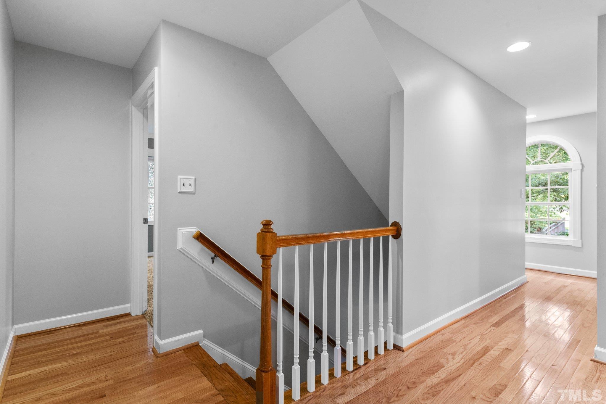 6304 Meerbrook Court Raleigh, NC 27603 - Photo 19 of 30 a view of a hallway with windows