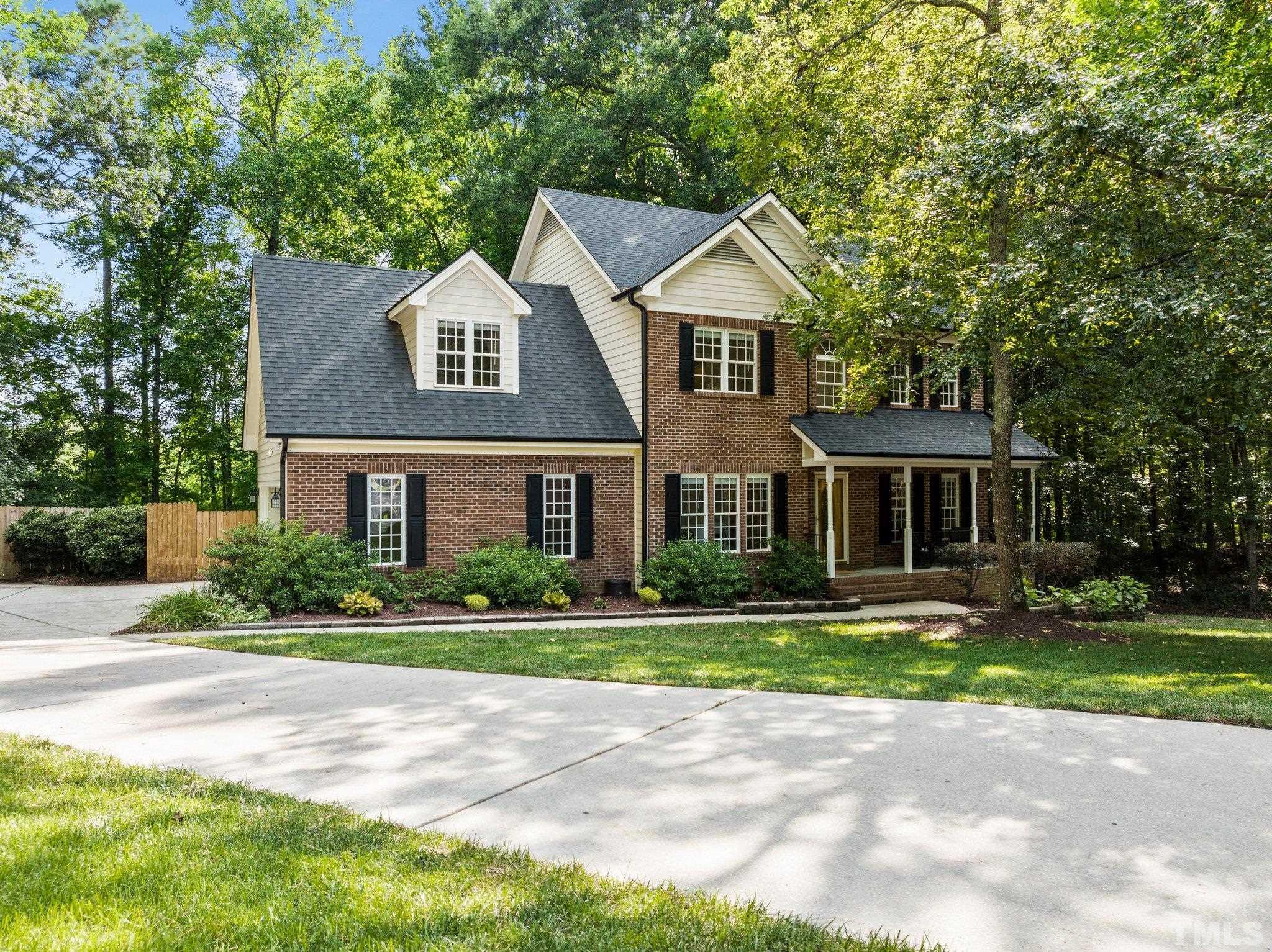 6304 Meerbrook Court Raleigh, NC 27603 - Photo 2 of 30 a front view of a house with a yard