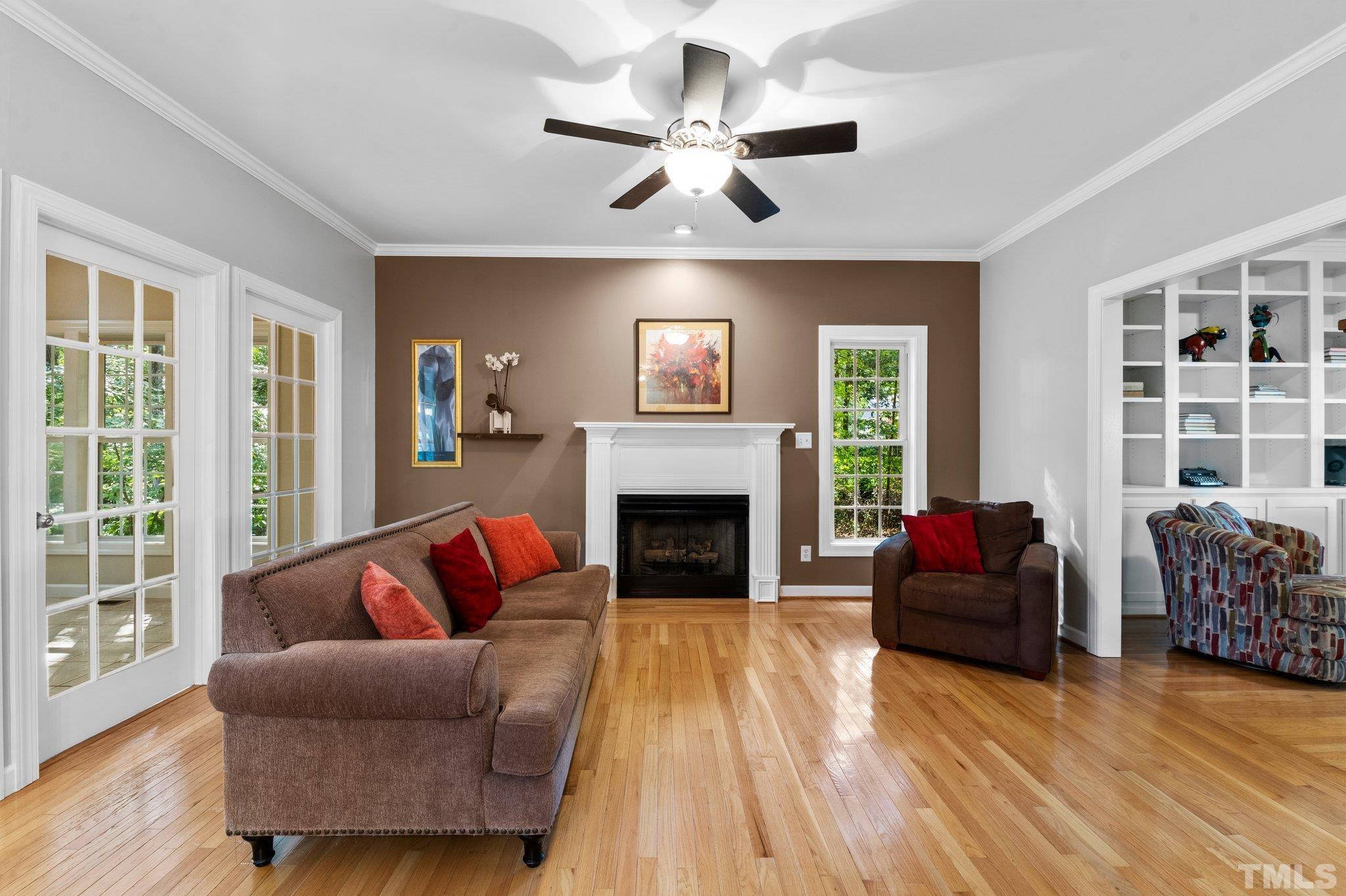 6304 Meerbrook Court Raleigh, NC 27603 - Photo 6 of 30 a living room with furniture and a fireplace