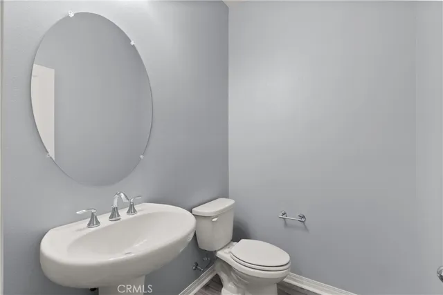 a view of a backyard with sitting area