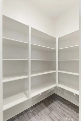 a spacious bathroom with a bathtub sink and mirror