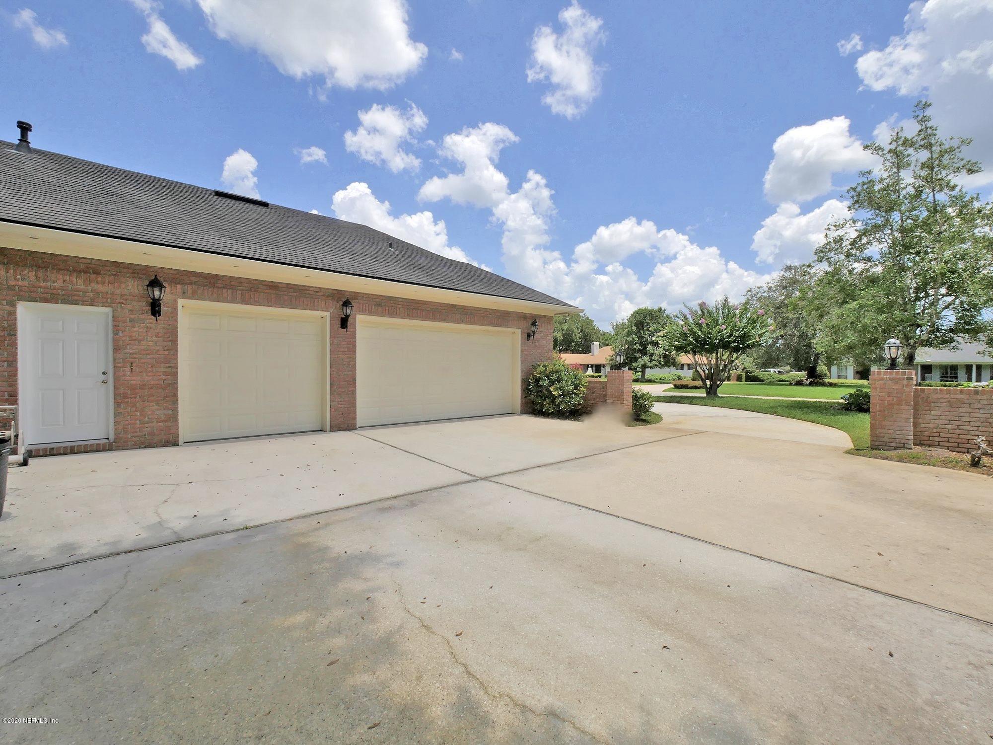 8224 Woodgrove Road Jacksonville, FL 32256 - Photo 31 of 43 3 Car Side Entry Garage