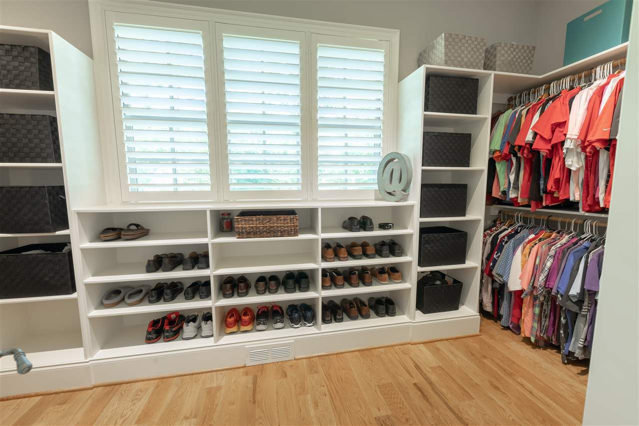 1437 Tacketts Pond Drive Raleigh, NC 27614 - Photo 12 of 30 Built-in shelving make it easy to keep your wardrobe organized. Master closet