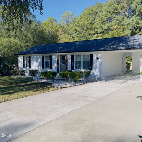 a view of a house with a swimming pool