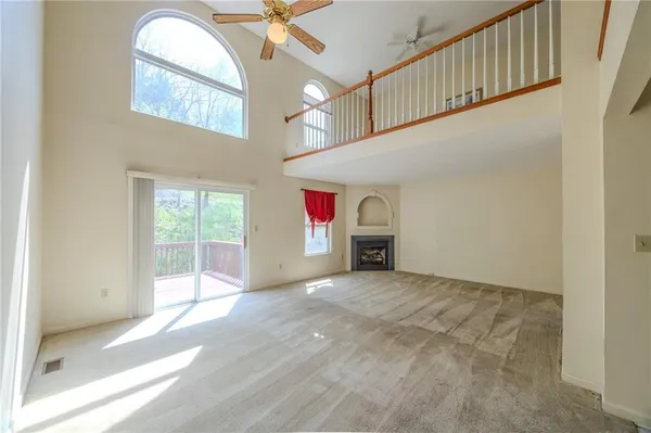 a view of an empty room and window