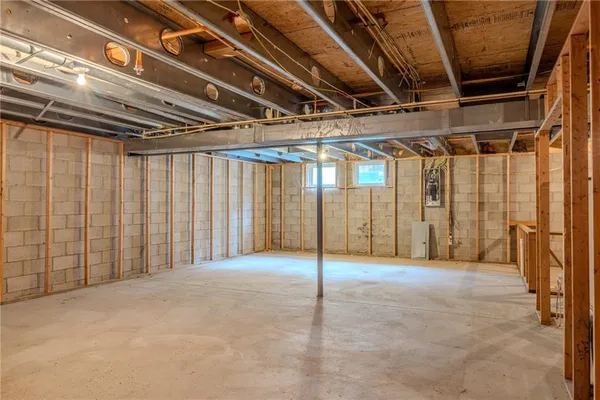 a view of a room with wooden walls