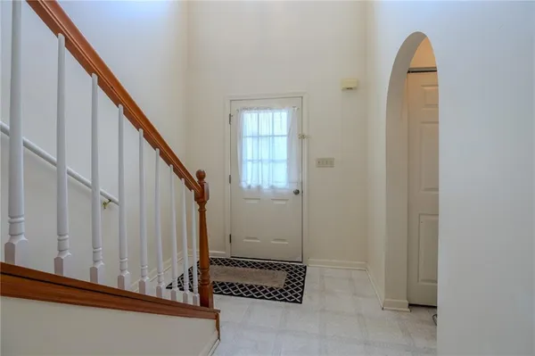a view of an entryway with staircase