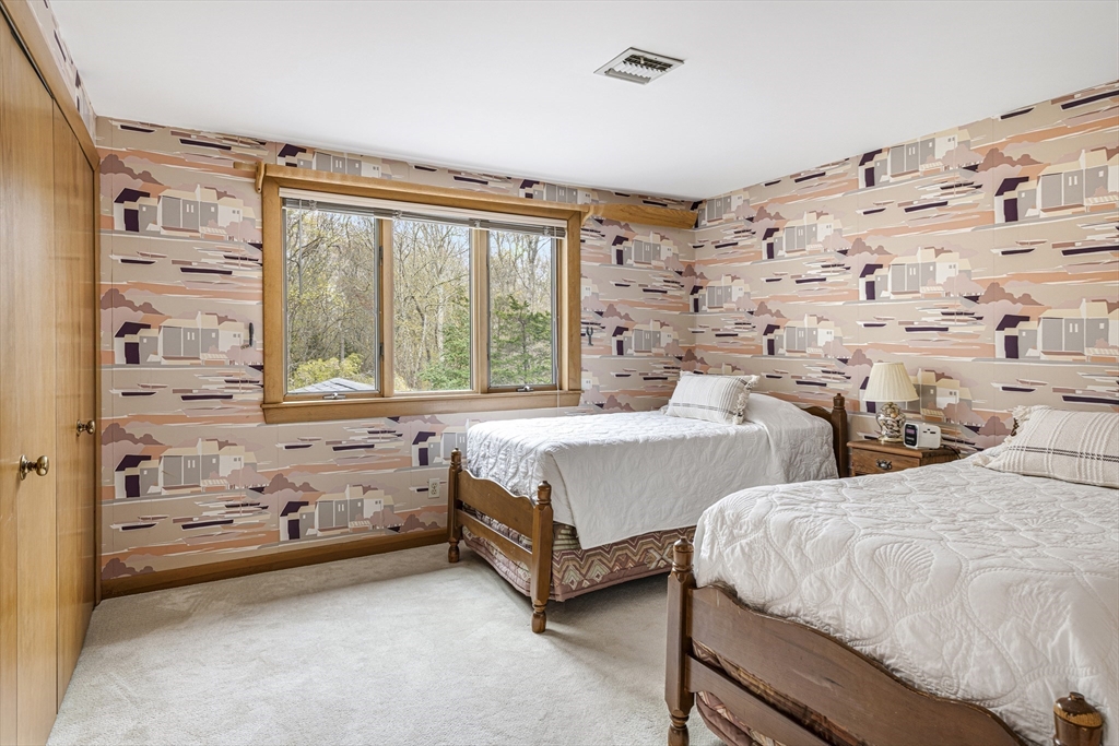 94 Howland Road Westport, MA 02790 - Photo 25 of 33 a bedroom with bed and a large window