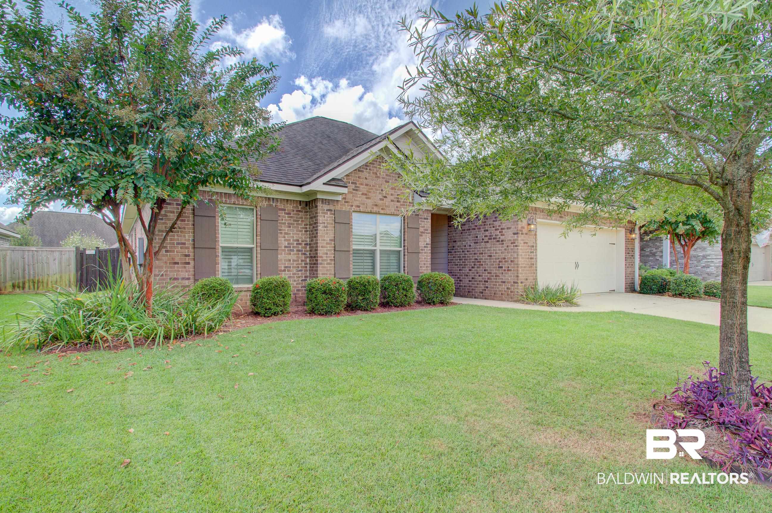 8625 Rosedown Lane Daphne, AL 36526 - Photo 26 of 29 View of front of property featuring a front yard and a garage