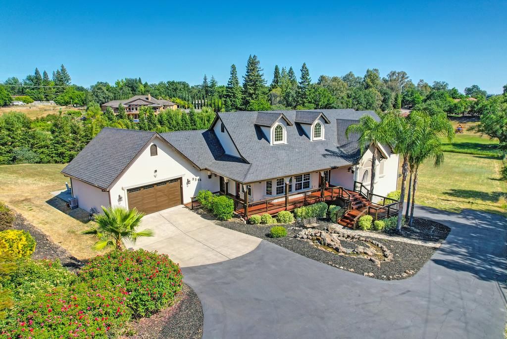9344 Cherry Avenue Orangevale, CA 95662 - Photo 1 of 1 an aerial view of a house with a garden