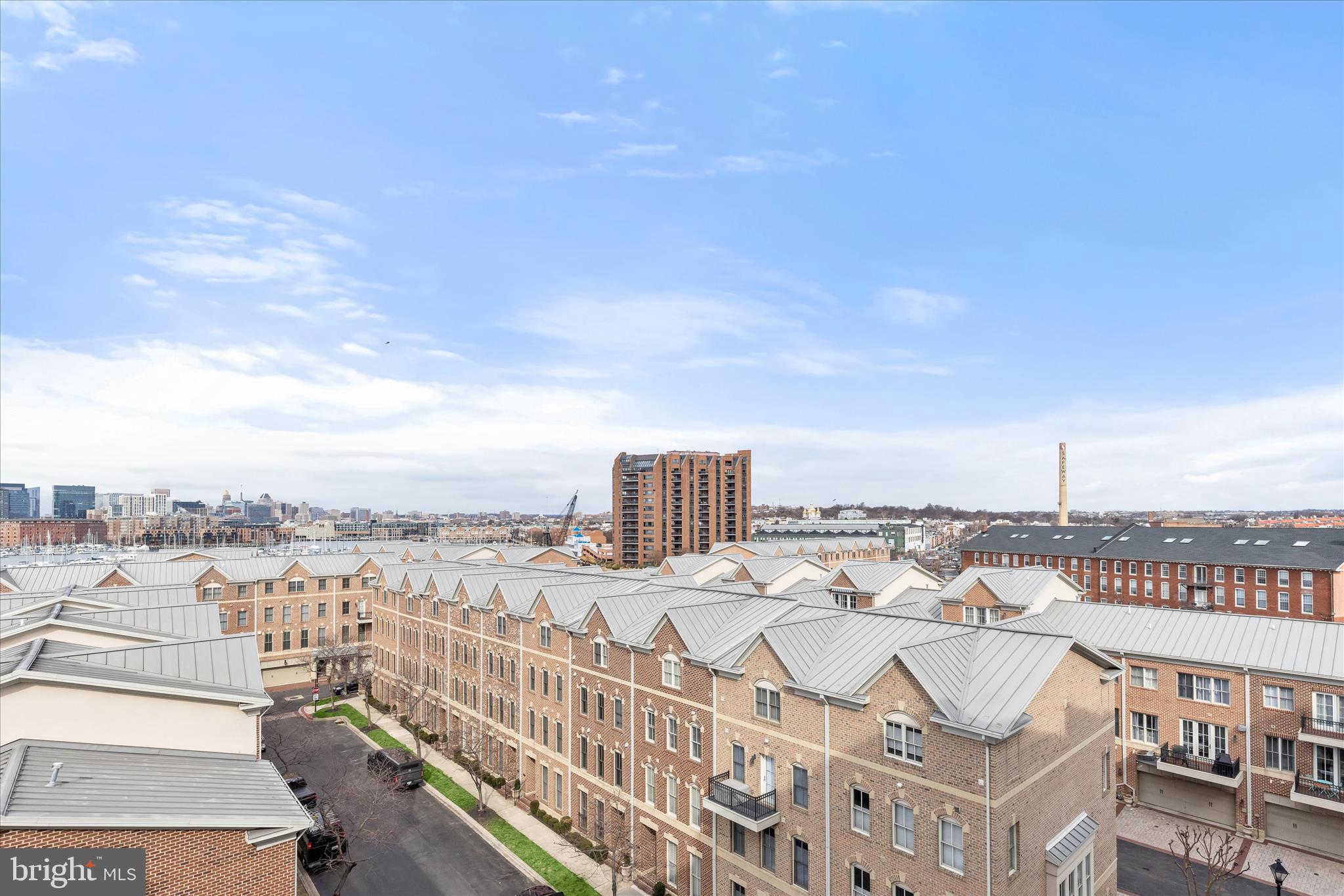 2702 Lighthouse Point East, Unit 522 Baltimore, MD 21224 - Photo 34 of 50 a view of a city from a terrace