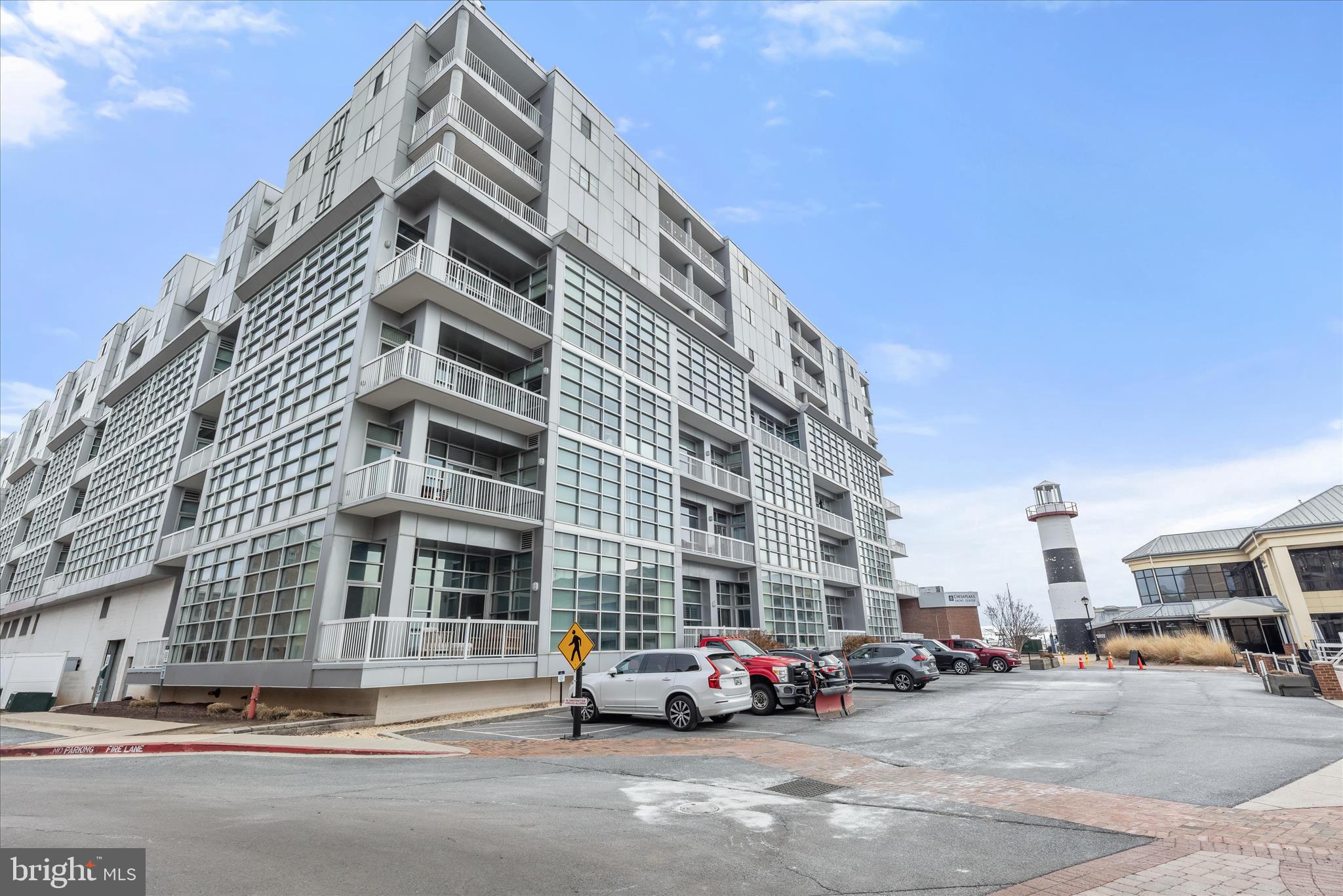 2702 Lighthouse Point East, Unit 522 Baltimore, MD 21224 - Photo 43 of 50 a car parked in front of a building