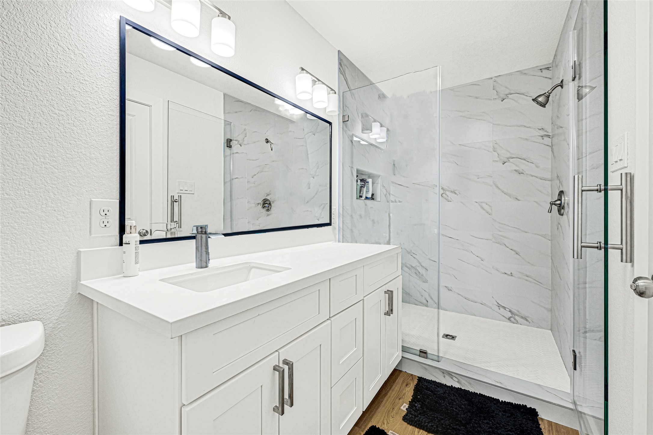 1107 Brooks Street Houston, TX 77009 - Photo 18 of 30 a bathroom with a sink a toilet and shower