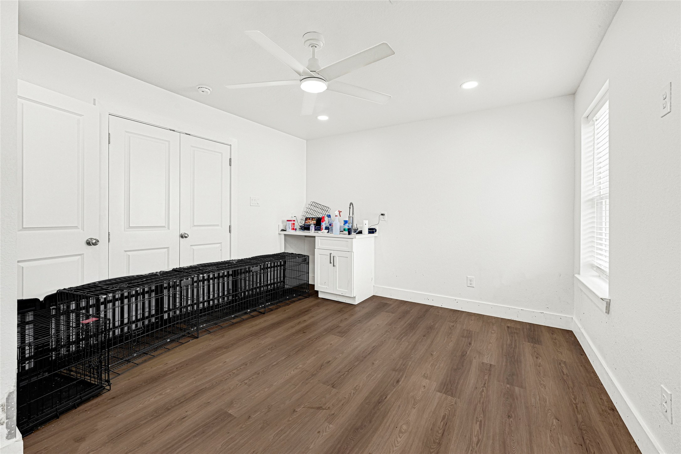 1107 Brooks Street Houston, TX 77009 - Photo 21 of 30 a view of an empty room with wooden floor