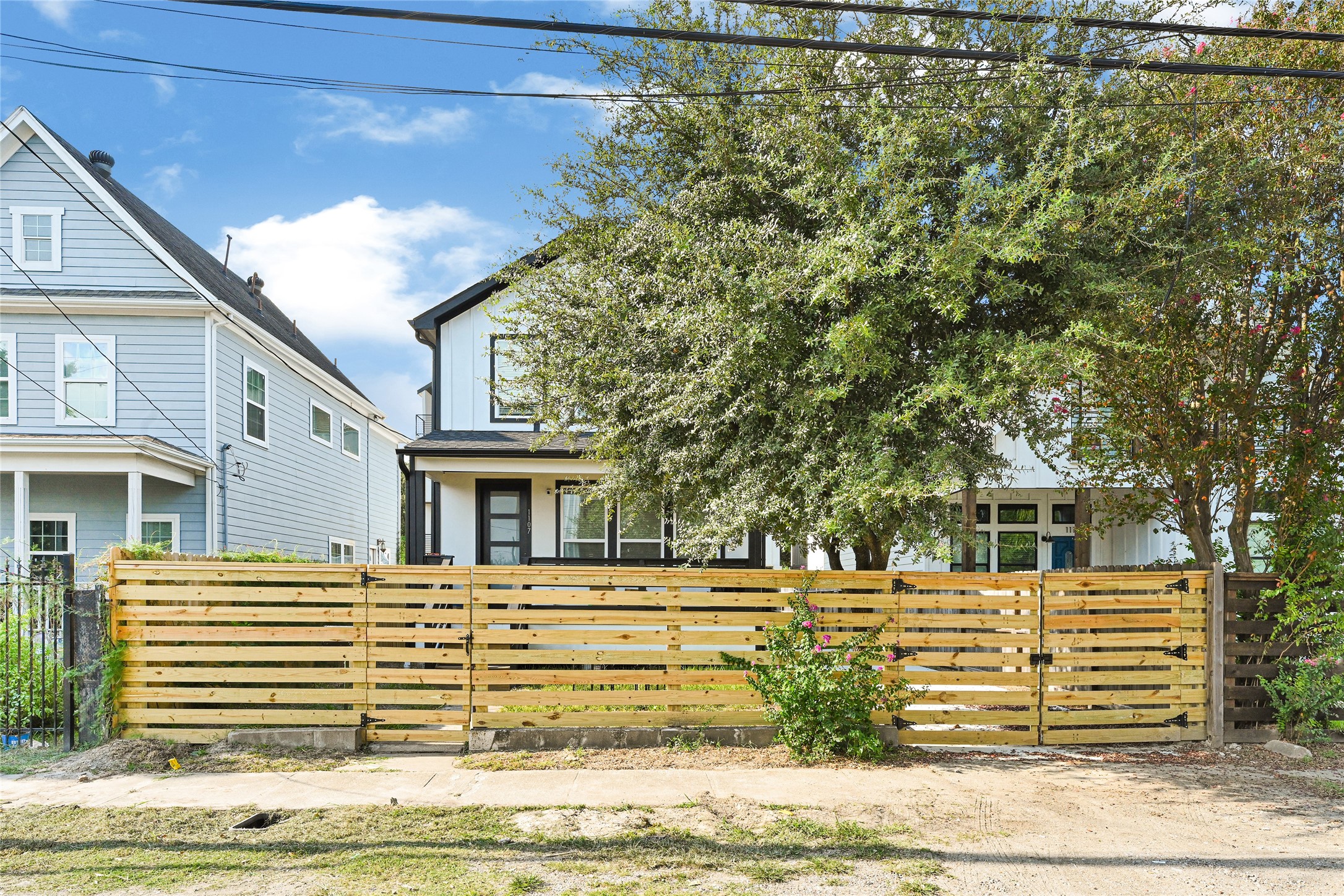 1107 Brooks Street Houston, TX 77009 - Photo 22 of 30 a front view of a house with a yard