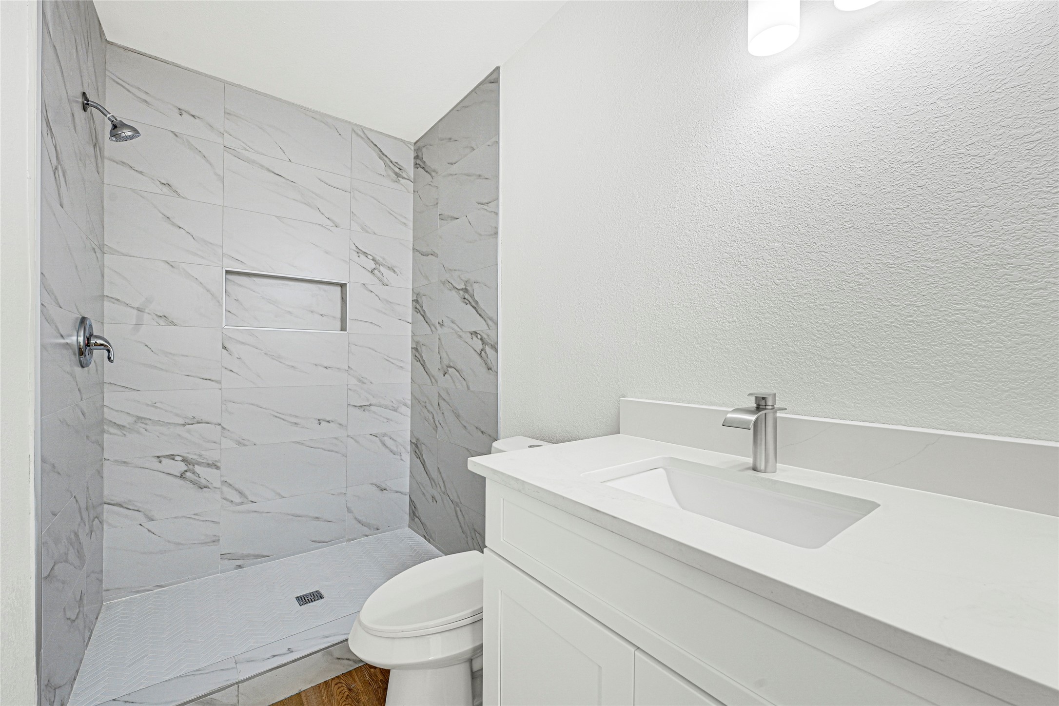 1107 Brooks Street Houston, TX 77009 - Photo 27 of 30 a bathroom with a sink toilet and shower