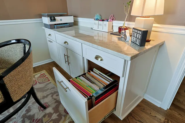 a close view of two chairs in a kitchen