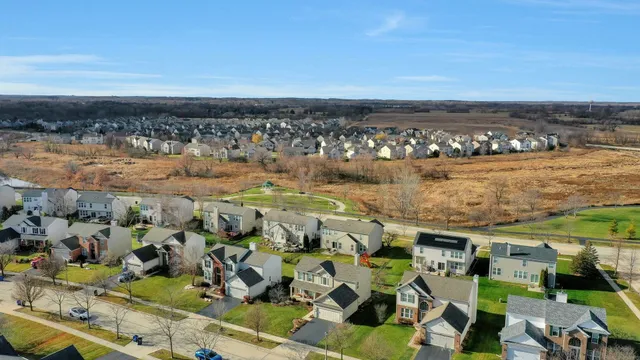a view of a lake with a yard