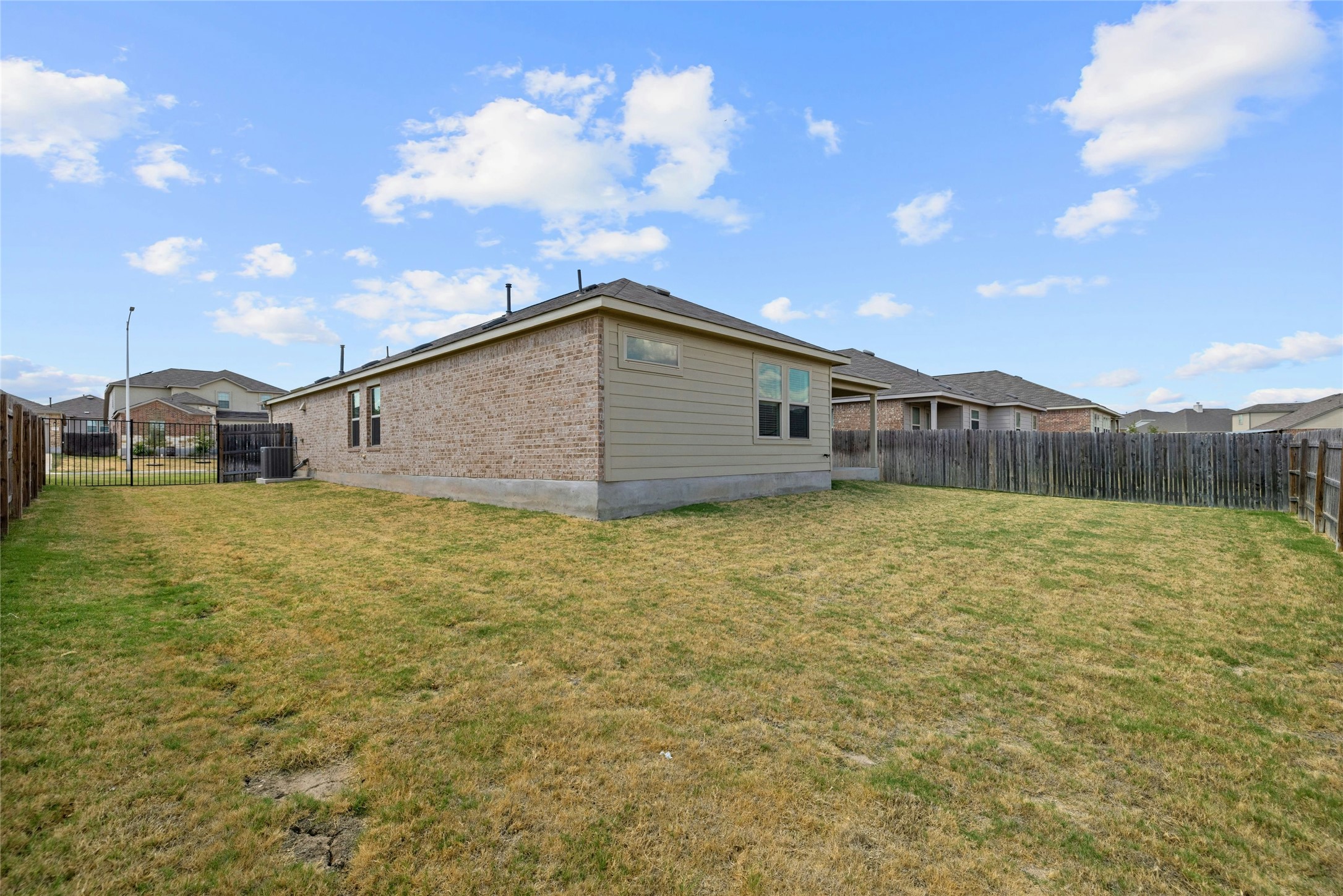 11813 Roscommon Trail Austin, TX 78754 - Photo 5 of 28 a front view of a house with garden