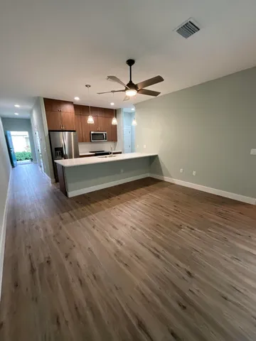 a living room with wooden floor