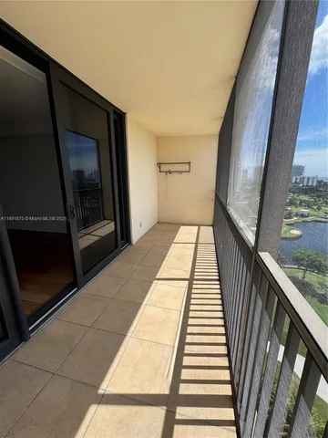 a view of a hallway view with staircase