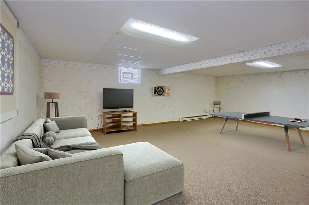 7950 Franklin Road Evans City, PA 16033 - Photo 29 of 43 Finished lower level with extra large storage room.