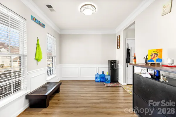 a view of living room with furniture and flat screen tv