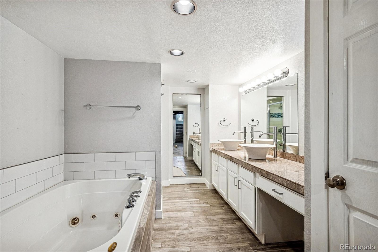 354 North Washington Street Denver, CO 80203 - Photo 31 of 43 a large white kitchen with a large window