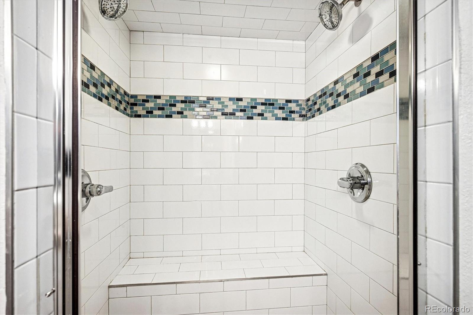 354 North Washington Street Denver, CO 80203 - Photo 33 of 43 a bathroom with a shower