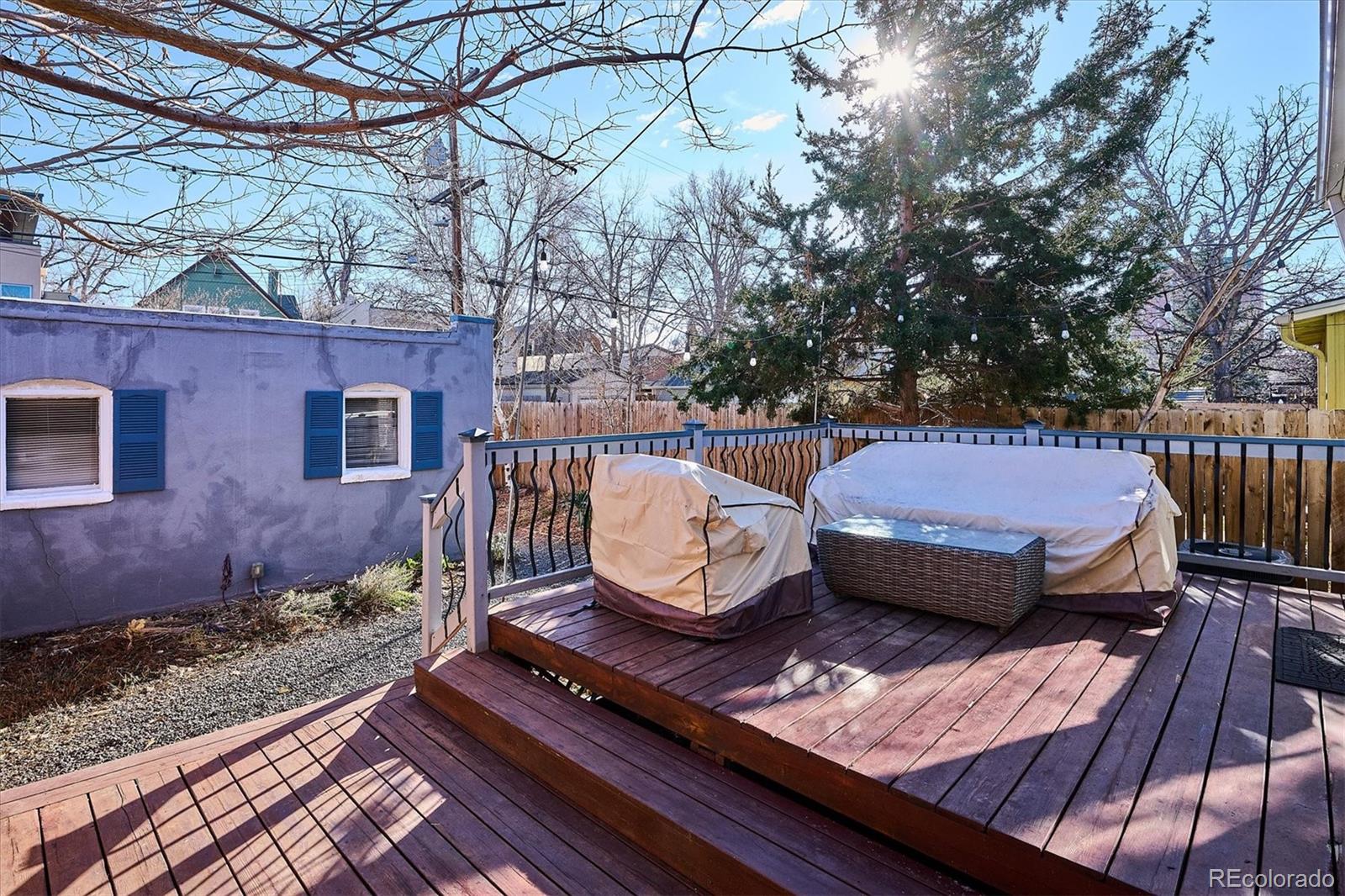 354 North Washington Street Denver, CO 80203 - Photo 37 of 43 a view of a wooden deck with furniture