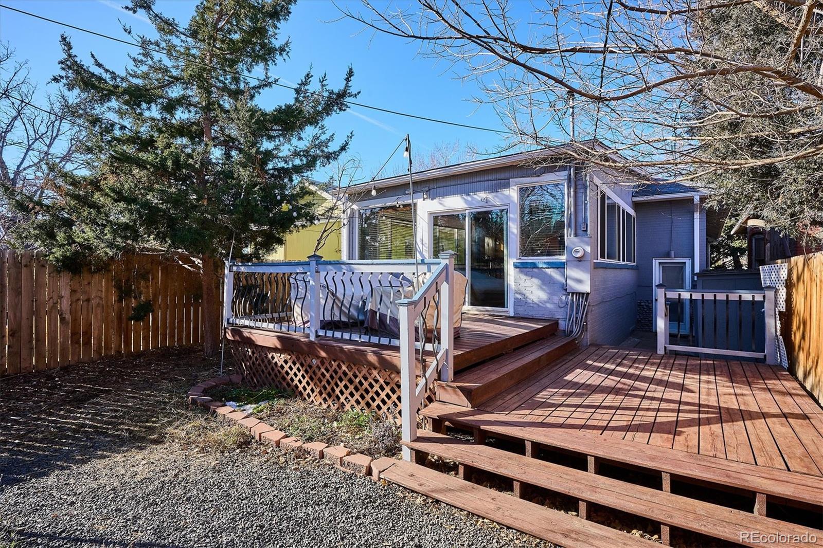 354 North Washington Street Denver, CO 80203 - Photo 39 of 43 a view of a house with backyard and sitting area