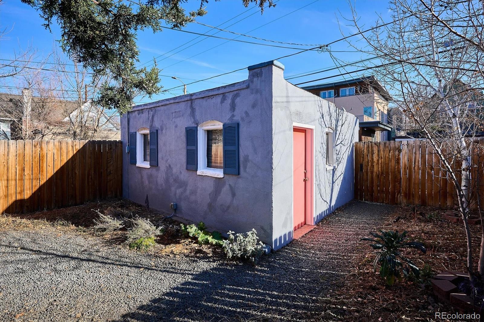 354 North Washington Street Denver, CO 80203 - Photo 41 of 43 a view of a house with a yard