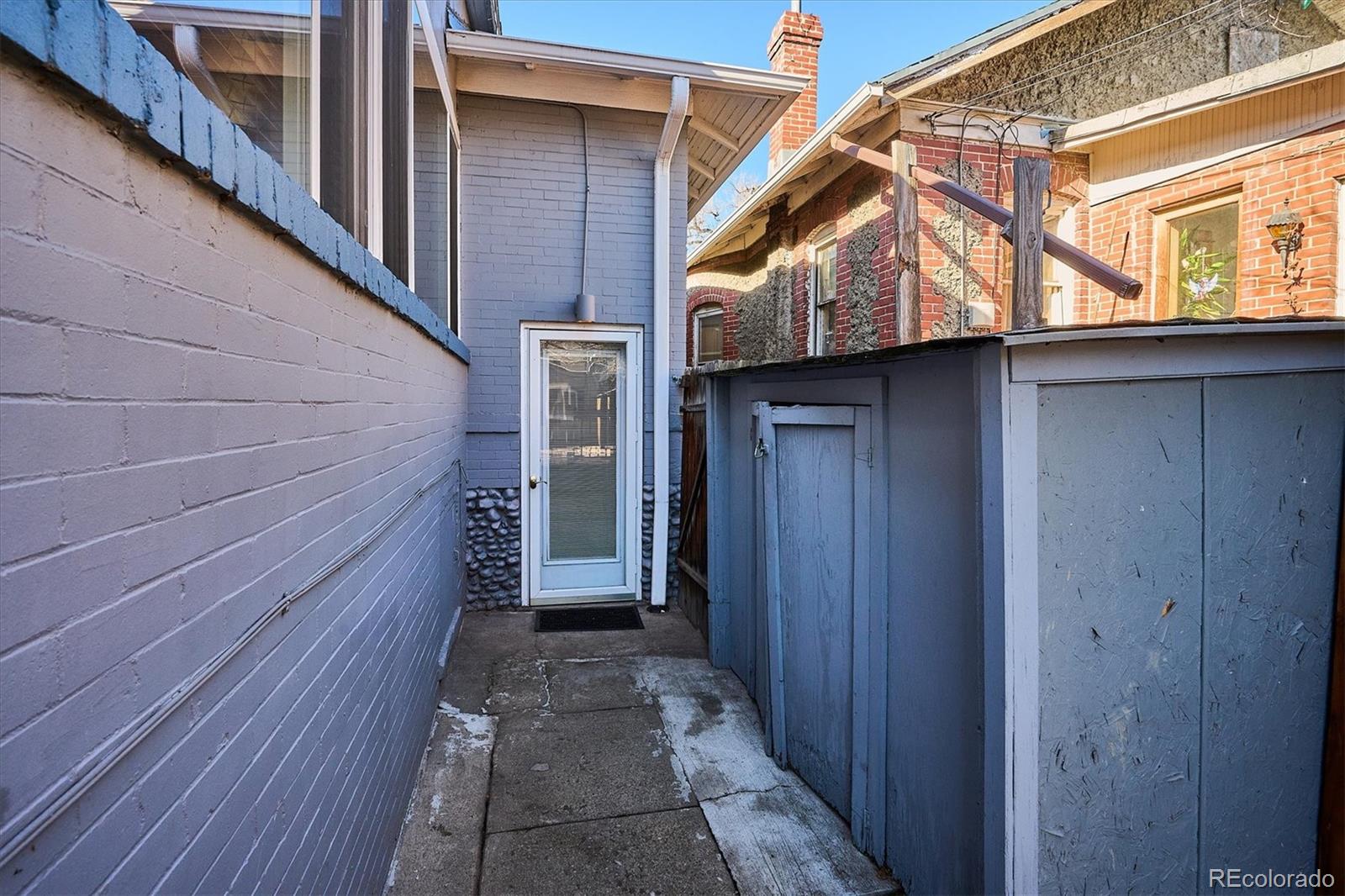 354 North Washington Street Denver, CO 80203 - Photo 43 of 43 a view of a house with a wooden deck