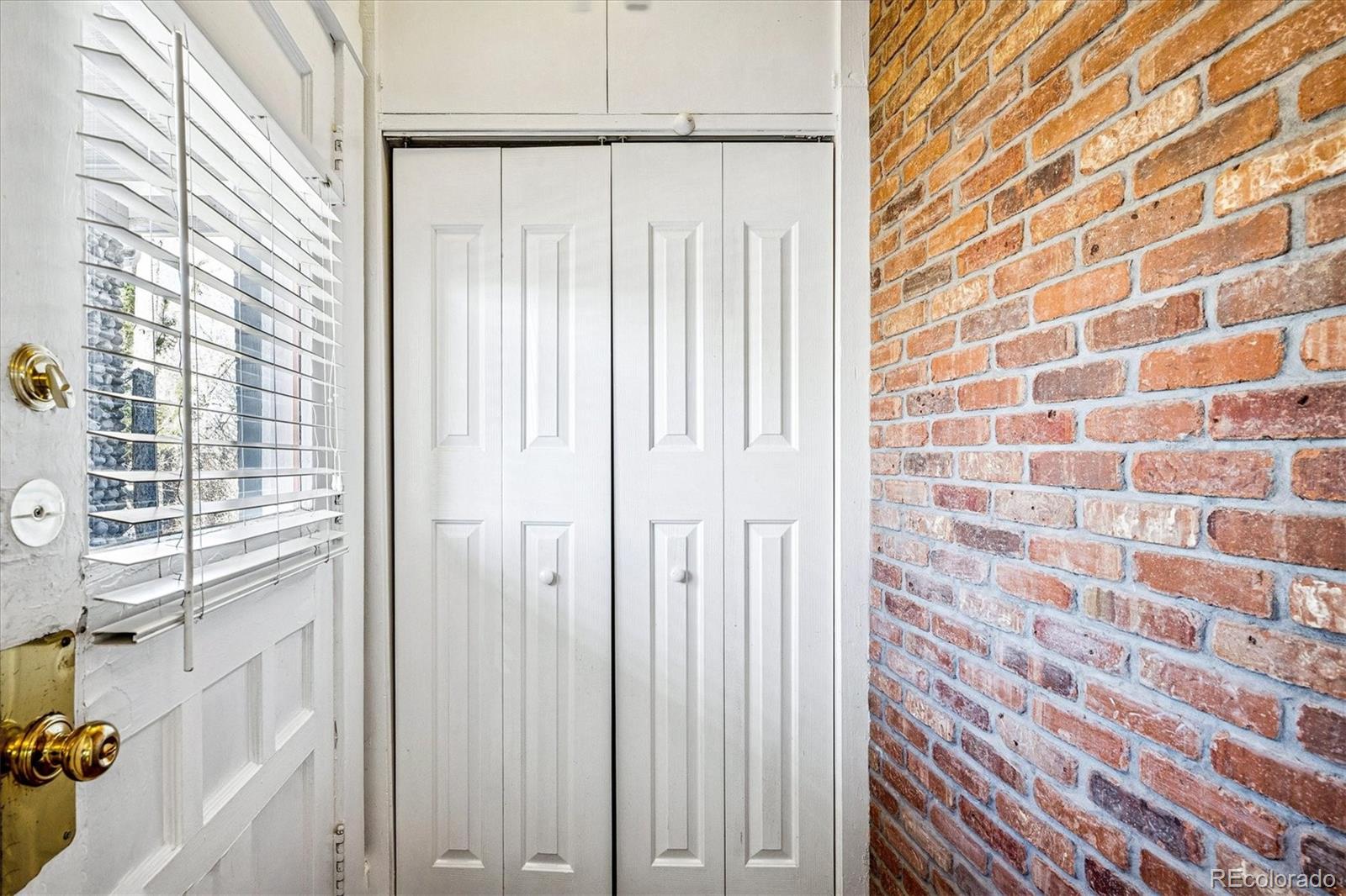 354 North Washington Street Denver, CO 80203 - Photo 9 of 43 a view of a bathroom with a shower curtain